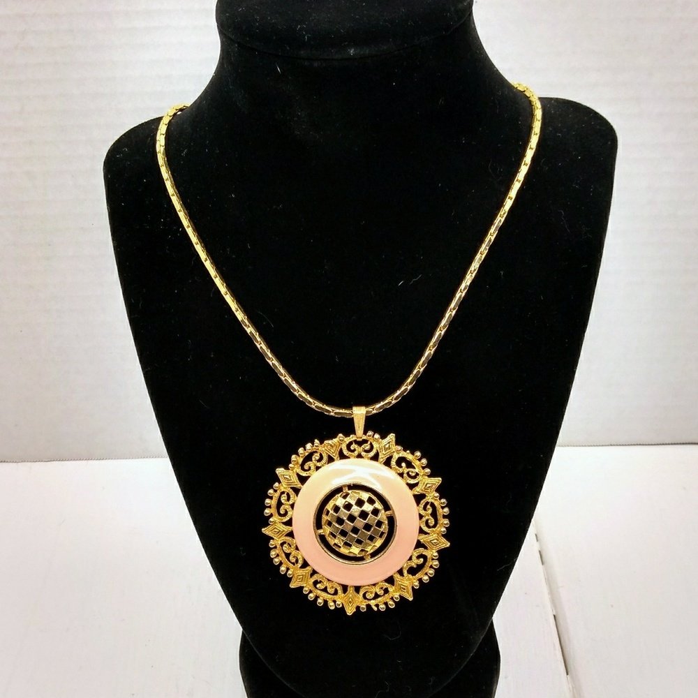 Gold tone serpentine with filagree medallion